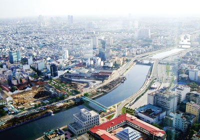 Ben Nghe-Tau Hu Canal has been dredged to reduce flooding in areas along the East West Highway in HCMC (Photo: SGGP) Ben Nghe-Tau Hu Canal has been dredged to reduce flooding in areas along the East West Highway in HCMC (Photo: SGGP)